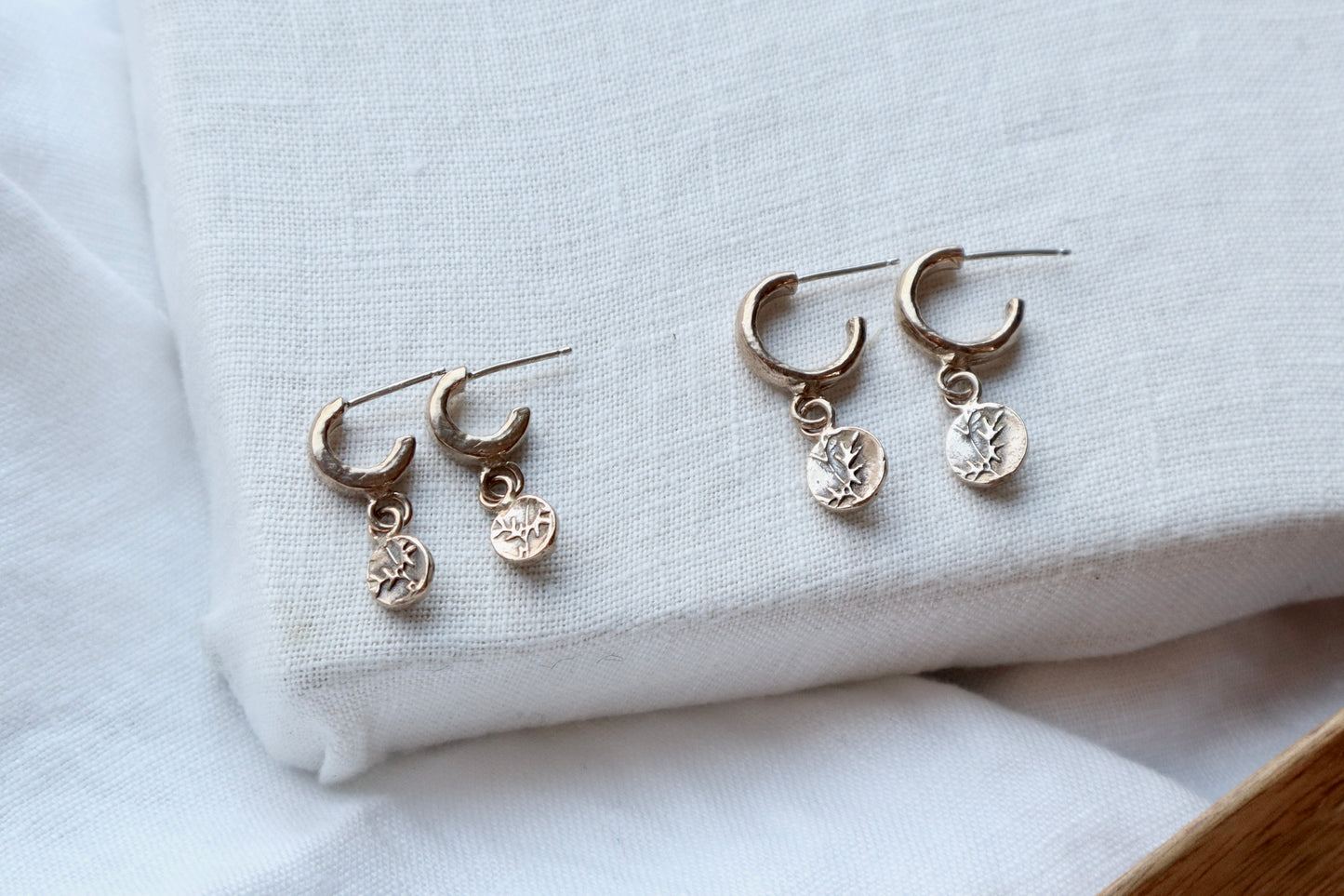 Lou huggie studs in bronze