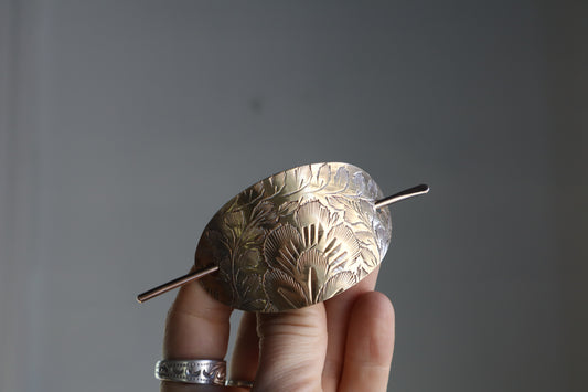Folk hair slide