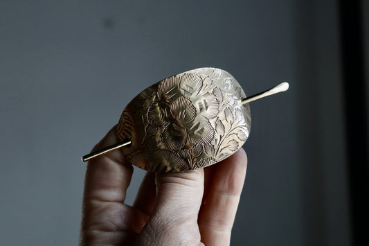 Folk hair slide