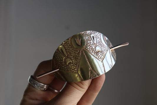 Folk hair slide