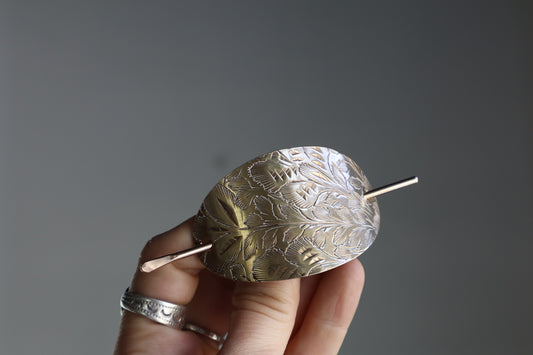 Folk hair slide