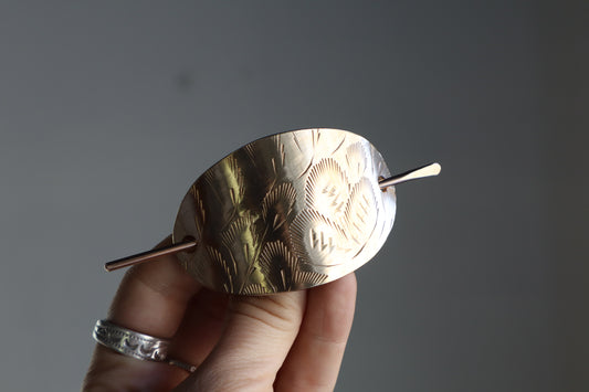 Folk hair slide