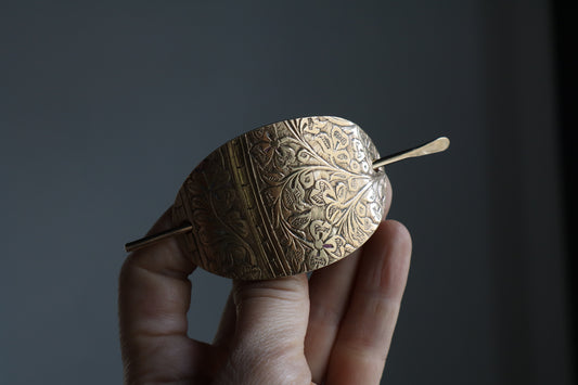 Folk hair slide