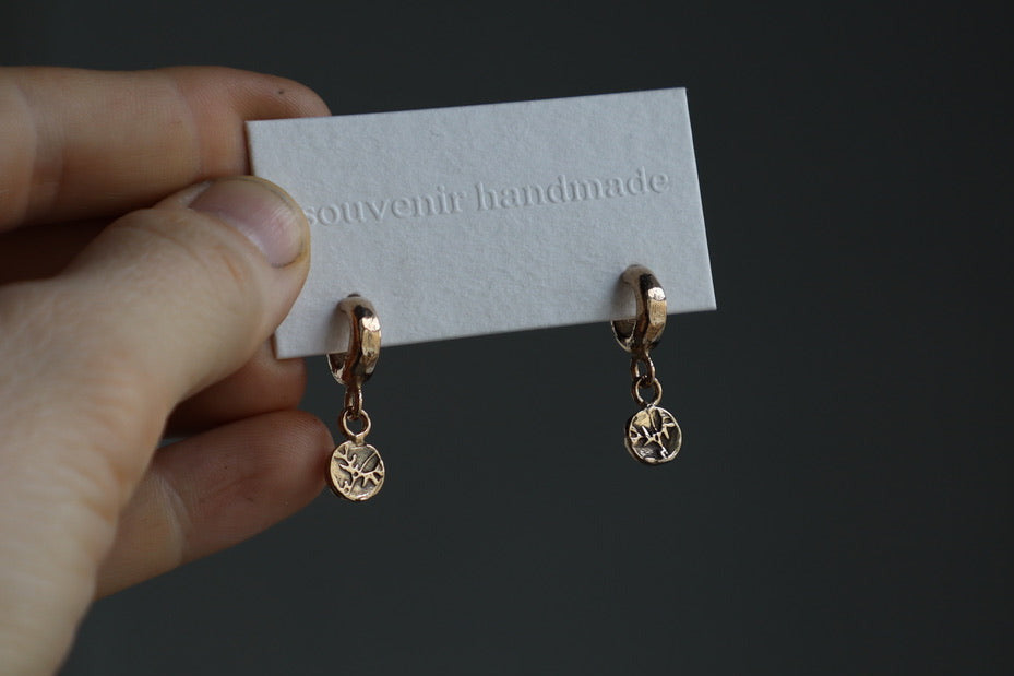 Lou huggie studs in bronze