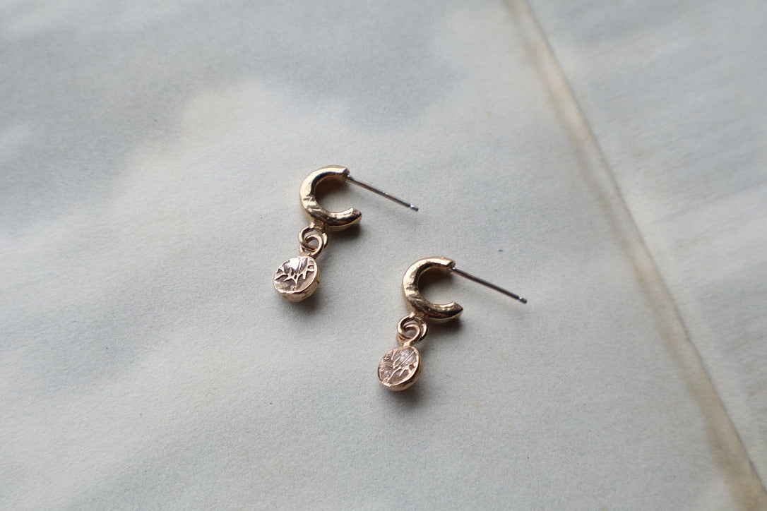 Lou huggie studs in bronze