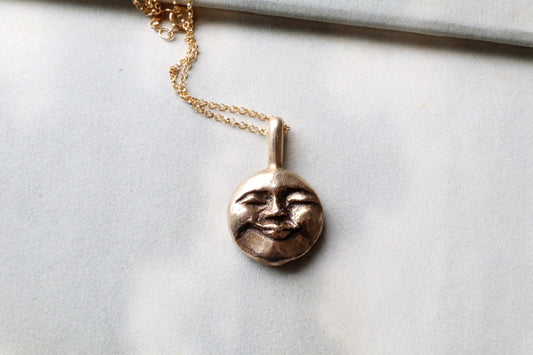 Moon face talisman necklace