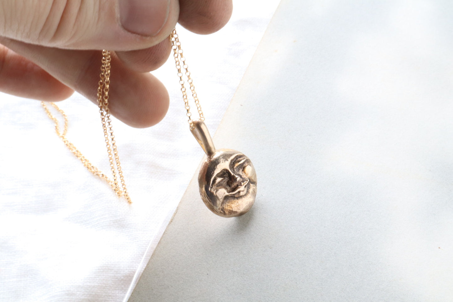 Moon face talisman necklace