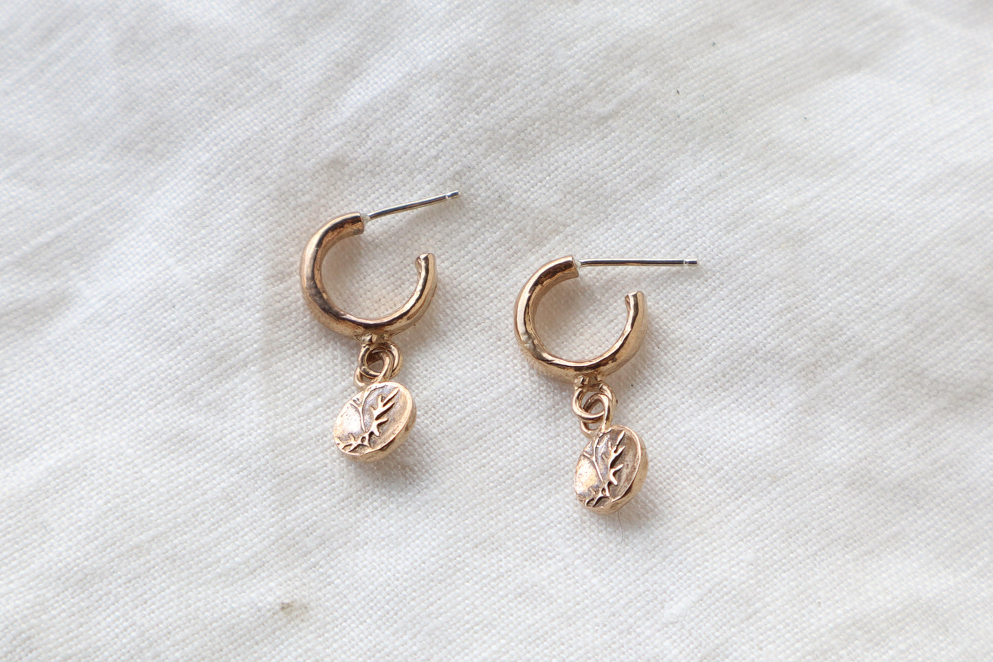 Lou huggie studs in bronze