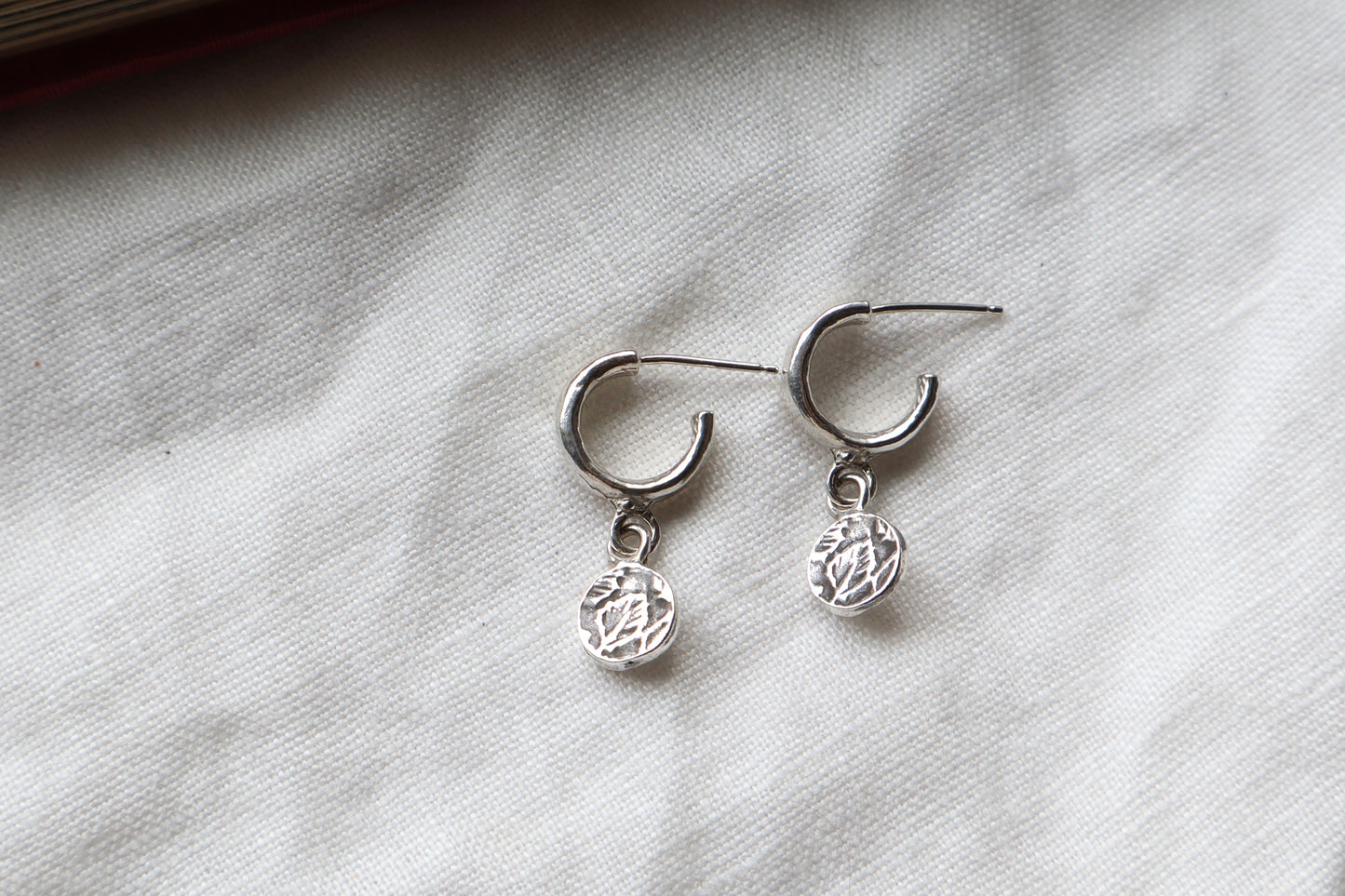 Lou huggie studs in sterling silver