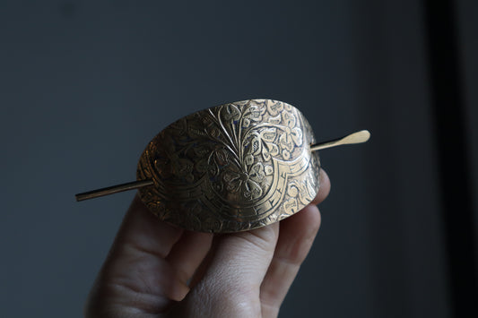Folk hair slide